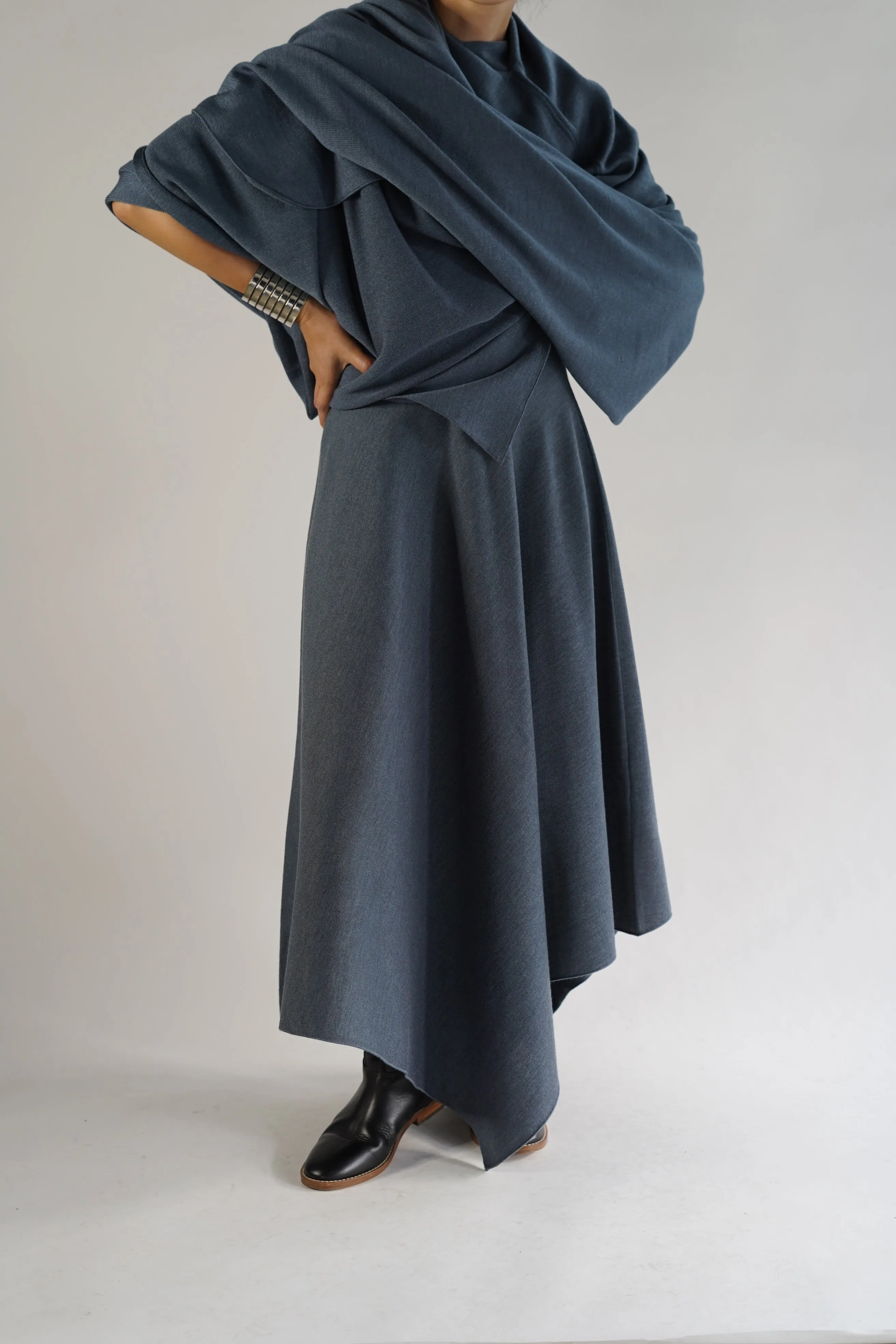 CRISTASEYA<br>DIAMANTE ASYMMETRICAL PONCHO<br>in BLUE